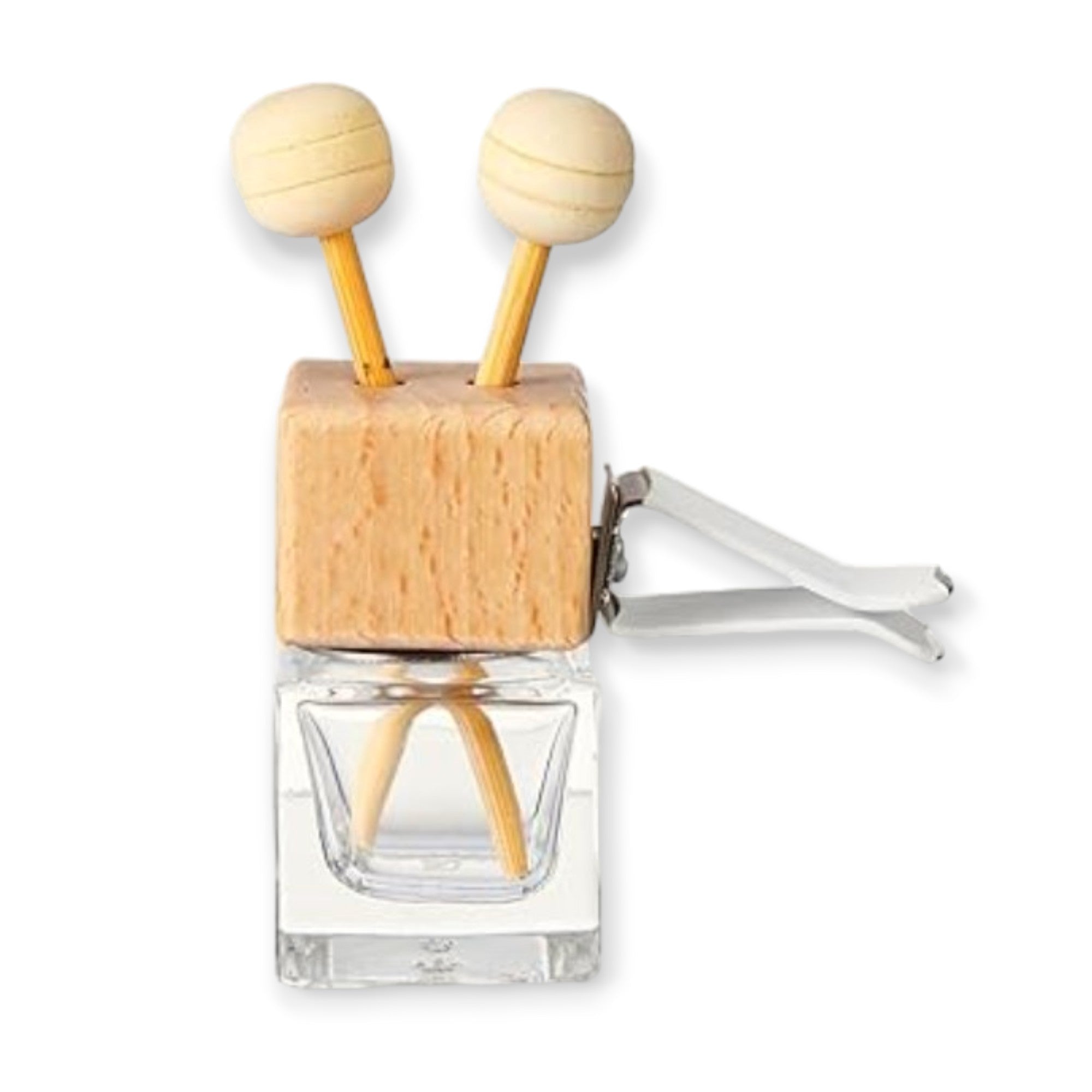 Refillism vanilla juniper car vent diffuser, refillable air freshener for eco-friendly freshening of vehicle interior.