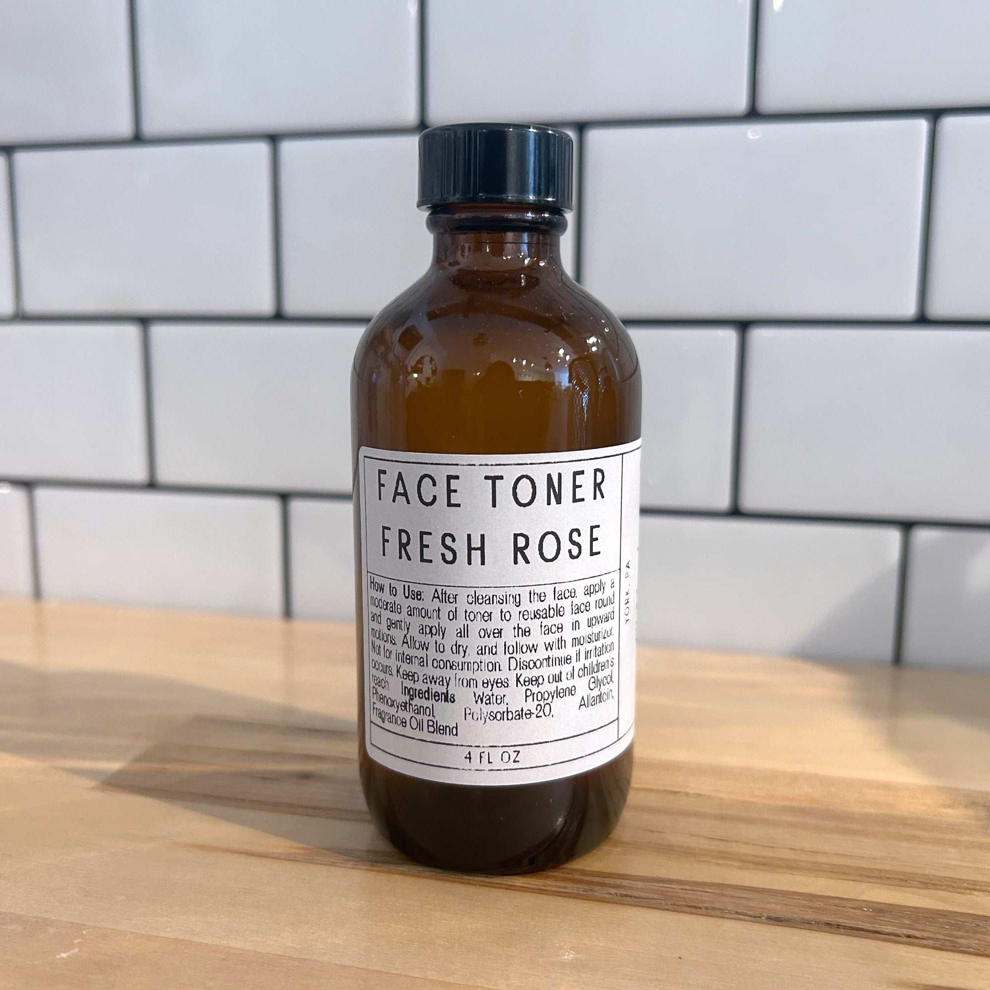 Refillism Fresh Rose Facial Toner in a 4oz bottle, featuring a clear liquid with rose scent, for personal skincare.