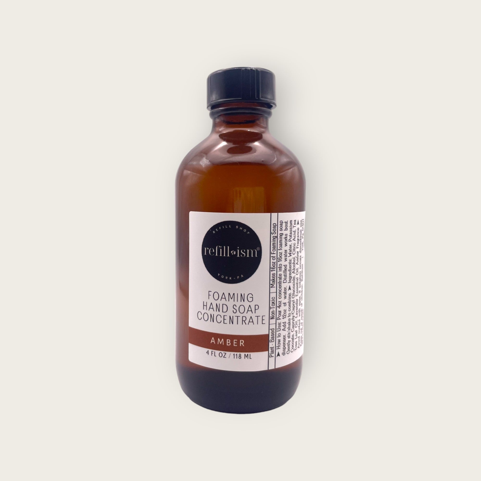 Refillism amber foaming hand soap concentrate in a clear bottle, personal care product with a pump dispenser.