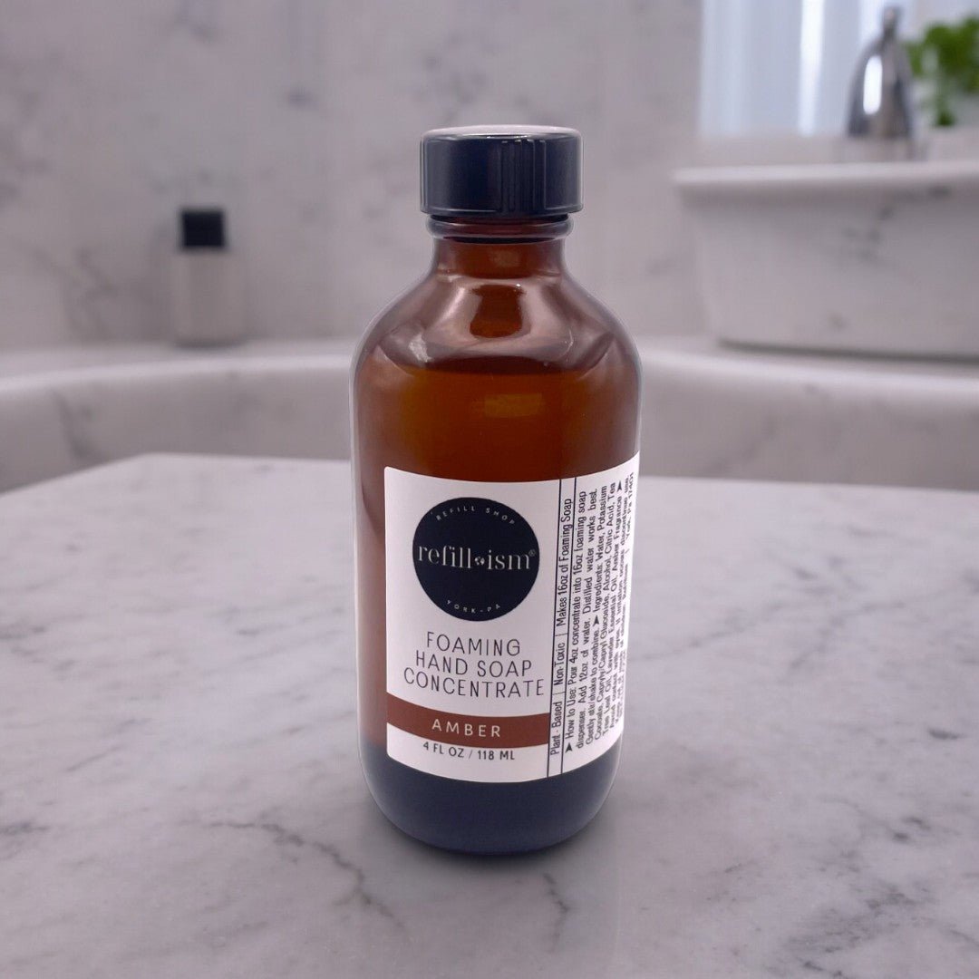 Refillism amber foaming hand soap concentrate in a clear refill bottle, designed for personal care and hand hygiene.