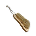 Foot and nail brush with wooden handle and sisal bristles by Refillism, designed for personal foot and nail cleaning.