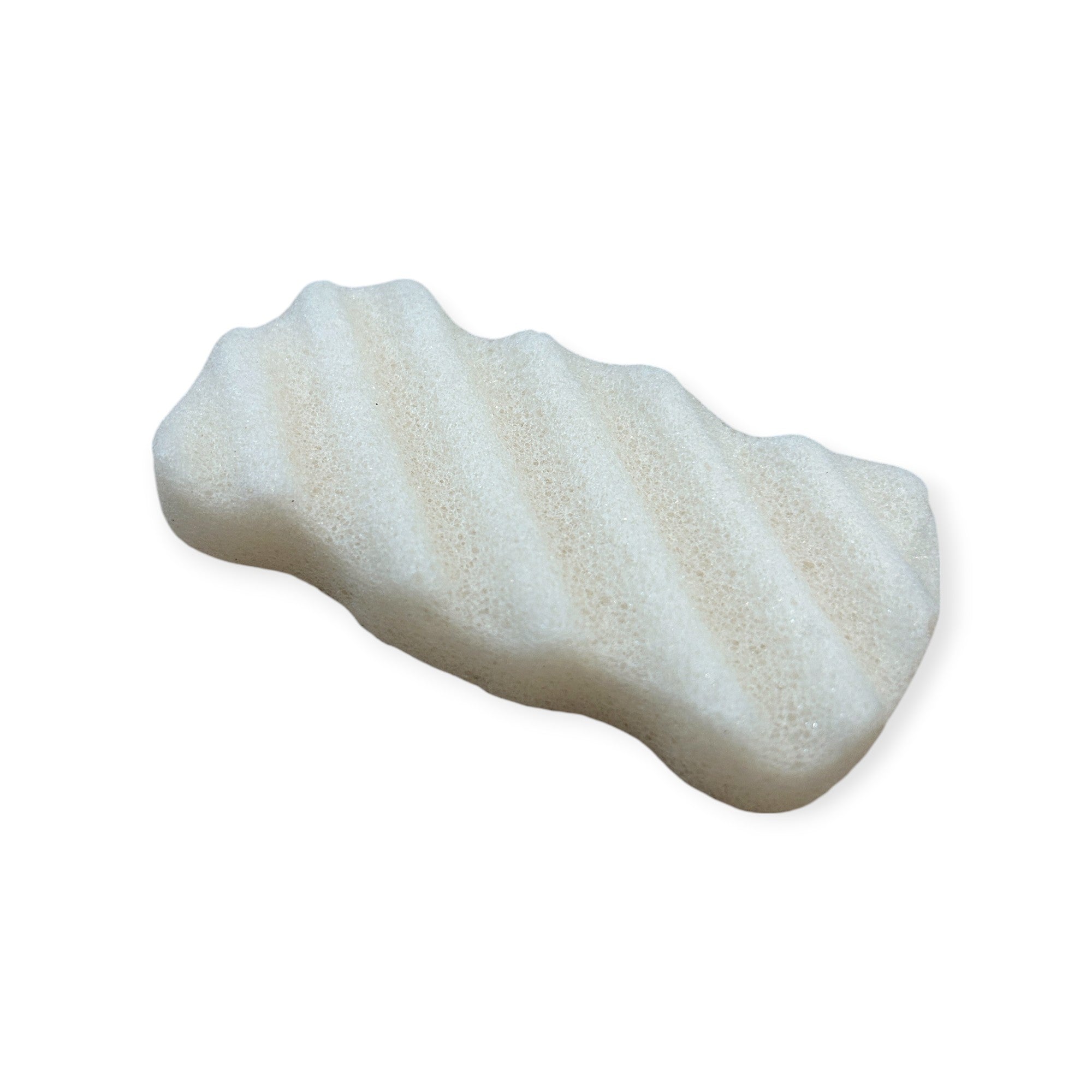 Wavy Konjac body sponge by Refillism for gentle exfoliation and personal care, shown in natural beige with a textured surface.
