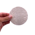 Refillism loofah pad for face and body exfoliation, 3.5-inch personal care scrubber with textured surface for gentle cleansing.