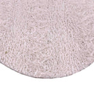 Refillism loofah pad for face and body exfoliation, 3.5-inch personal care scrubber with textured surface for gentle cleansing.