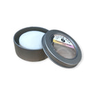 Refillism coconut milk and lavender lotion bar in a tin, natural personal care product with a soothing scent and compact design.