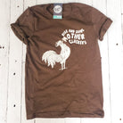 Unisex graphic tee from The Graphic Tee featuring a playful "Rise and Shine Mother Cluckers" design on soft fabric.