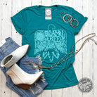 Unisex teal crewneck short sleeve graphic T-shirt by The Graphic Tee, featuring a casual design with a relaxed fit.