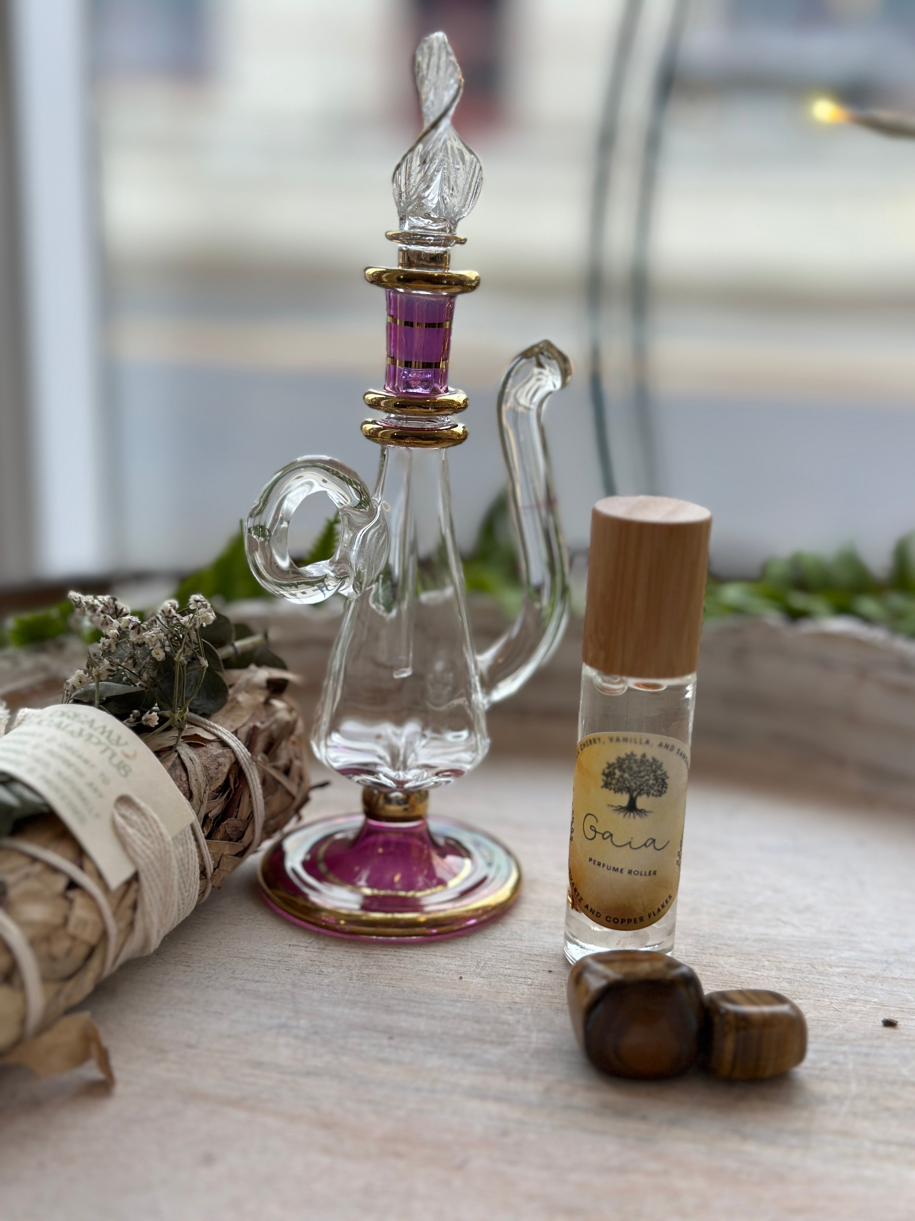 Sage & Stone Apothecary Goddess Perfume Roller body care product with a clear glass roller bottle and minimalist label design