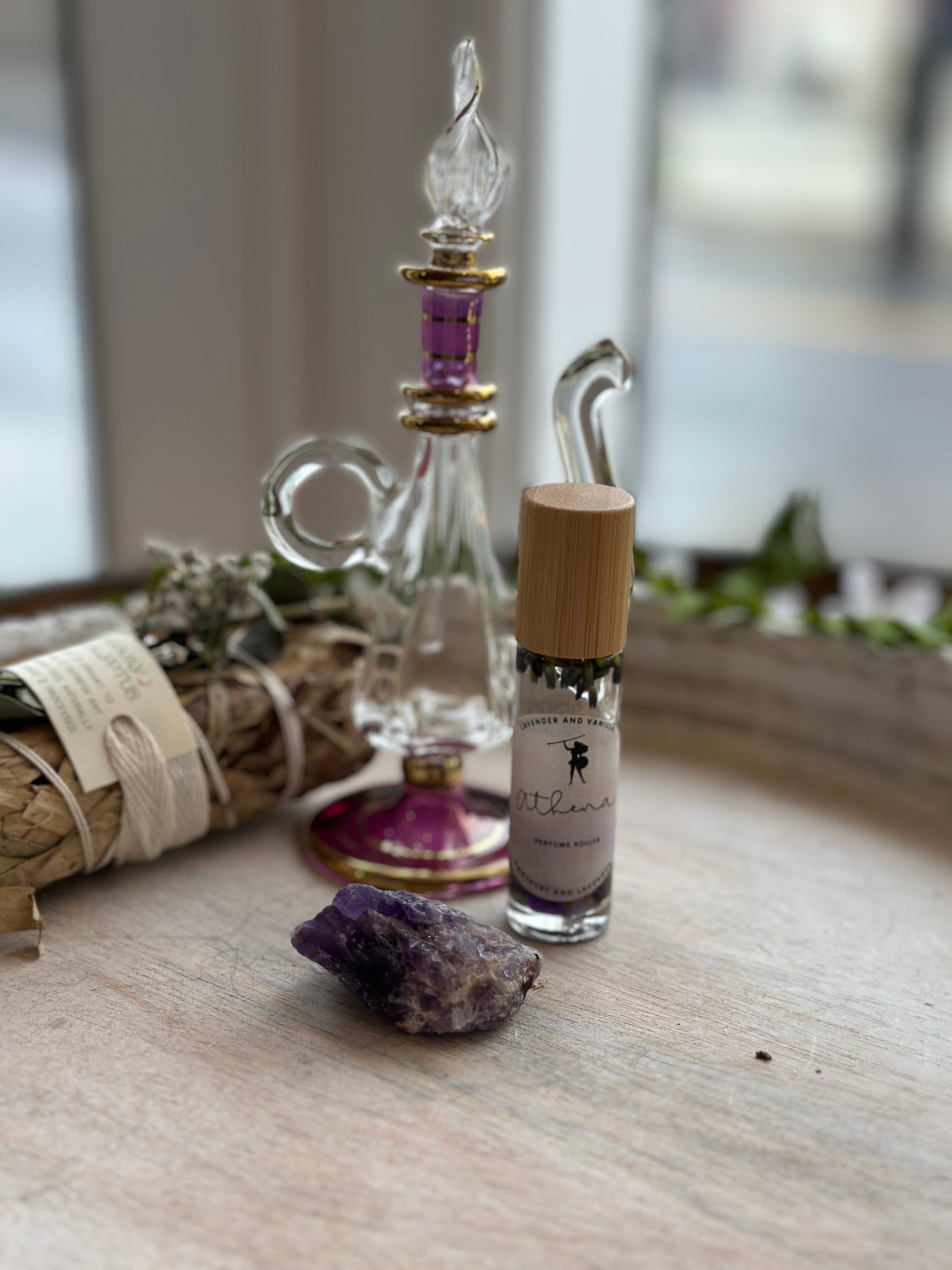Sage & Stone Apothecary Goddess Perfume Roller with floral and herbal scents in a clear glass roller bottle.