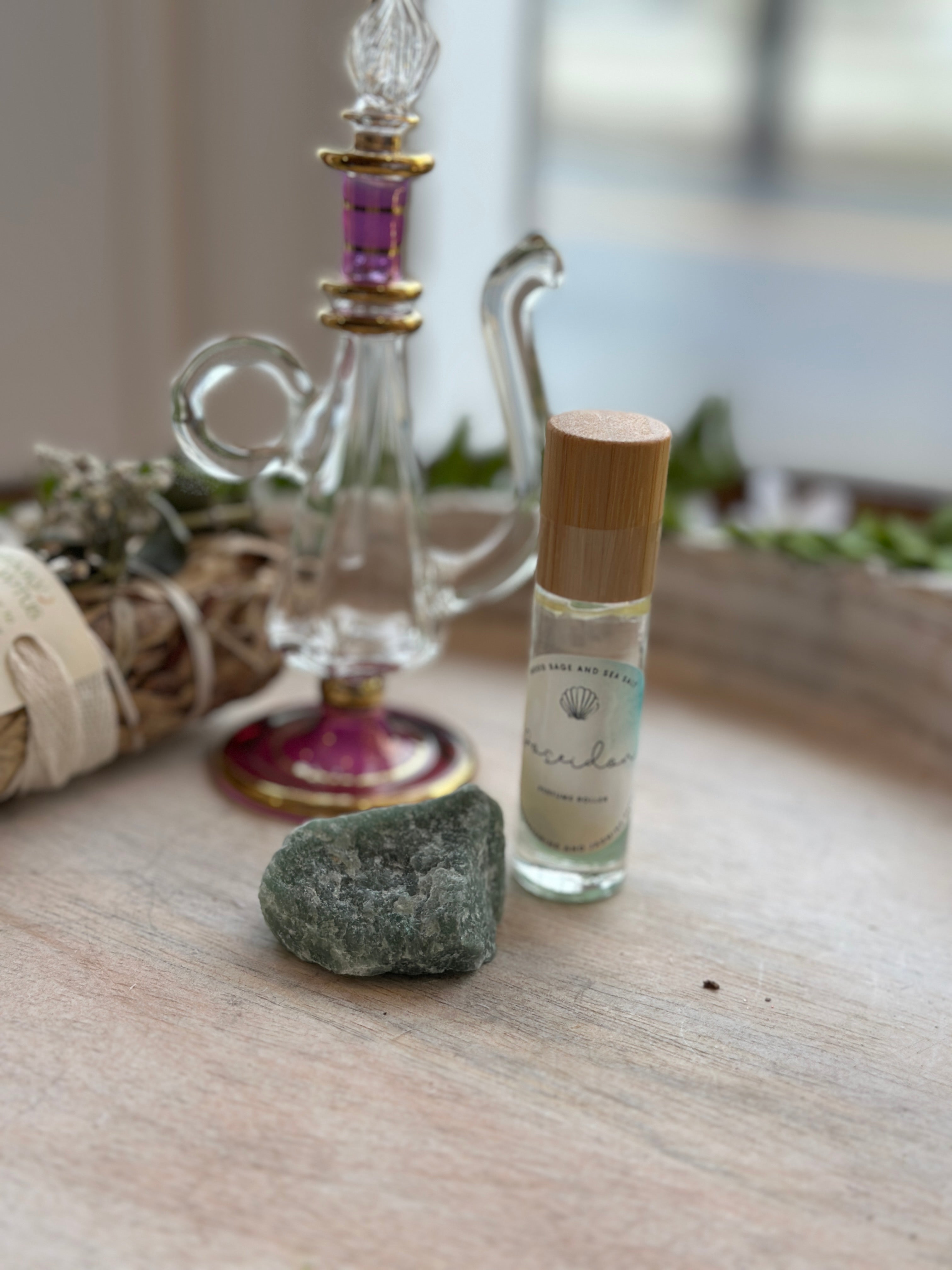 Sage & Stone Apothecary Goddess Perfume Roller with elegant glass bottle and stainless steel rollerball for body care fragrance application