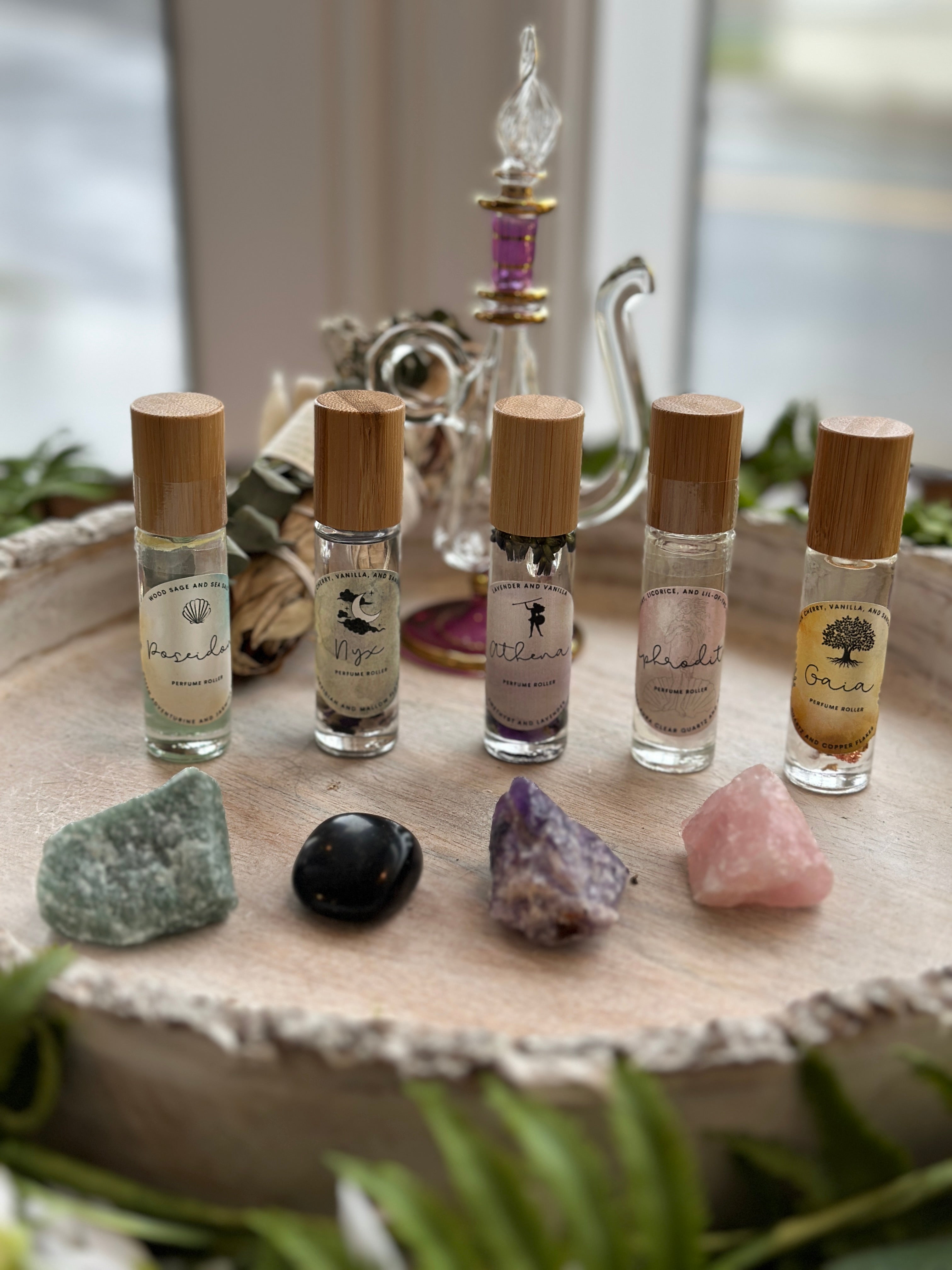 Sage & Stone Apothecary Goddess Perfume Roller body care product with a sleek glass rollerball applicator and elegant packaging.
