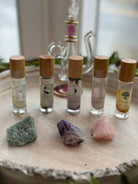 Sage & Stone Apothecary Goddess Perfume Roller with floral and herbal scents in a sleek glass roller bottle for body care.