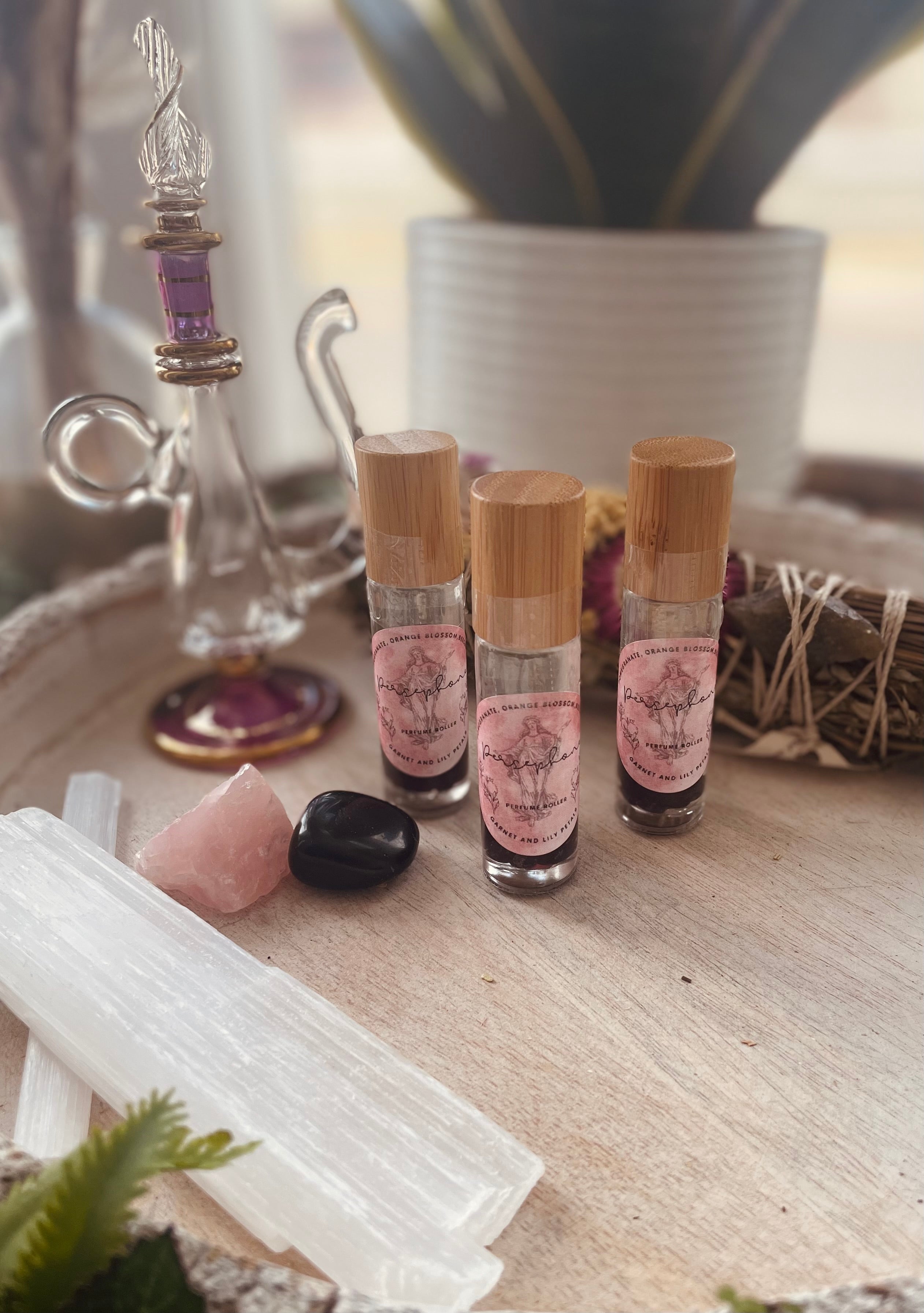Sage & Stone Apothecary Goddess Perfume Roller for body care, featuring a sleek roller bottle with floral and herbal design elements.