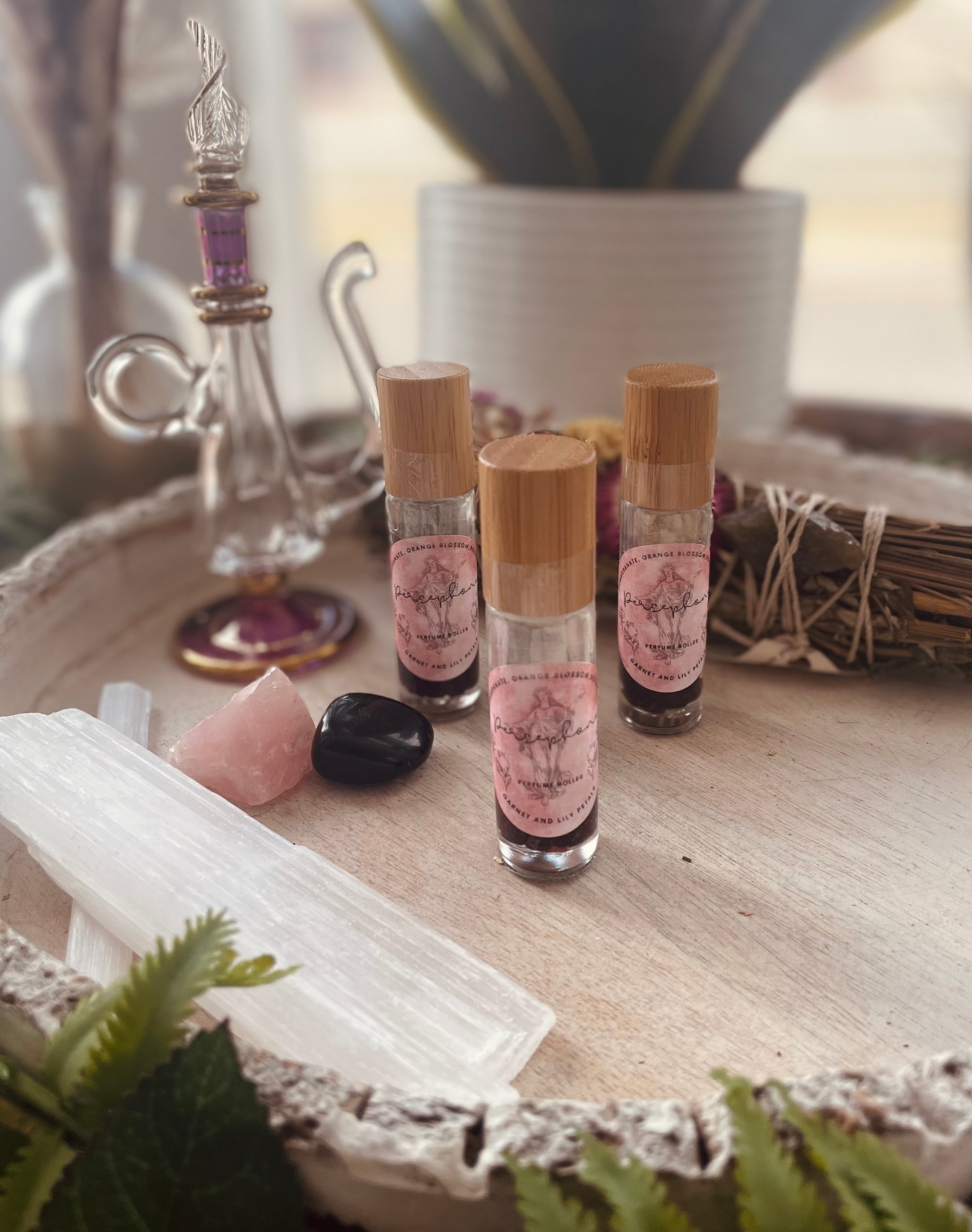 Sage & Stone Apothecary Goddess Perfume Roller with a sleek glass rollerball bottle, ideal for body care and fragrance.