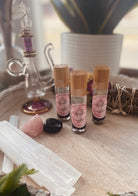 Sage & Stone Apothecary Goddess Perfume Roller with floral and herbal scents, in a sleek glass roller bottle for body care.