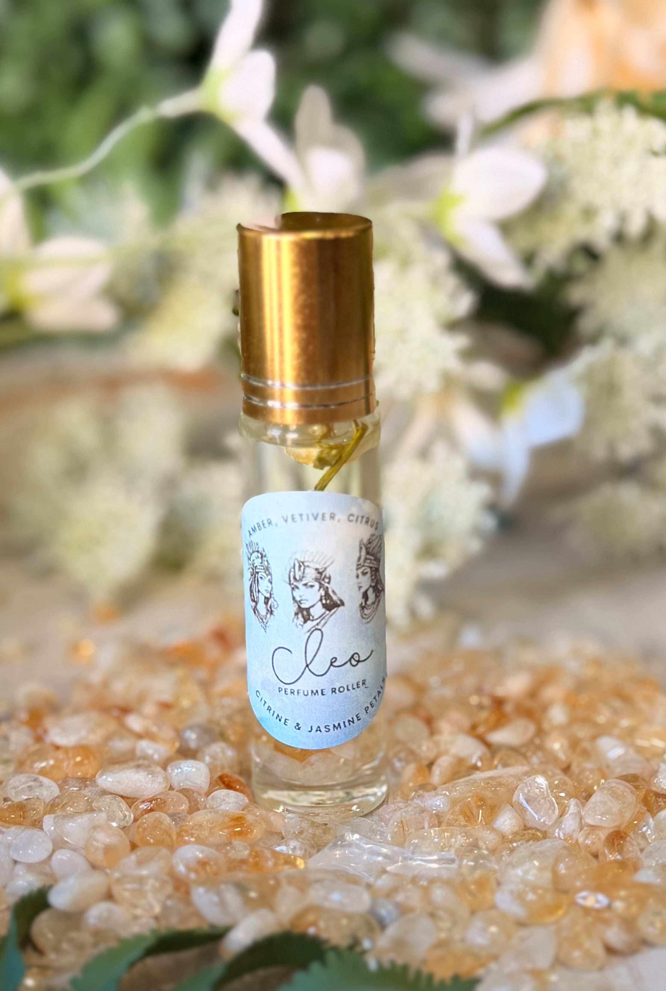 Sage & Stone Apothecary Goddess Perfume Roller, a body care product featuring a sleek glass roller bottle with floral and herbal scents.