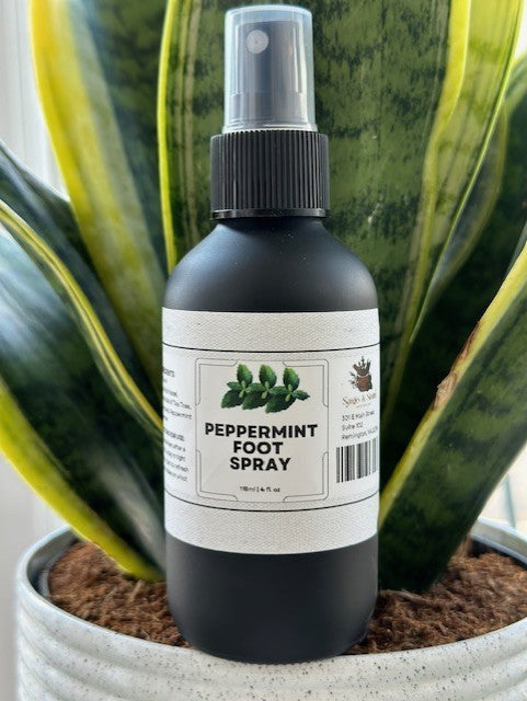 Sage & Stone Apothecary peppermint foot spray bottle with a clear label, designed for refreshing and soothing foot care.