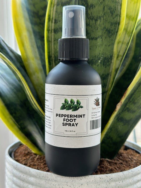 Sage & Stone Apothecary peppermint foot spray bottle with labeled packaging, designed for refreshing foot care.