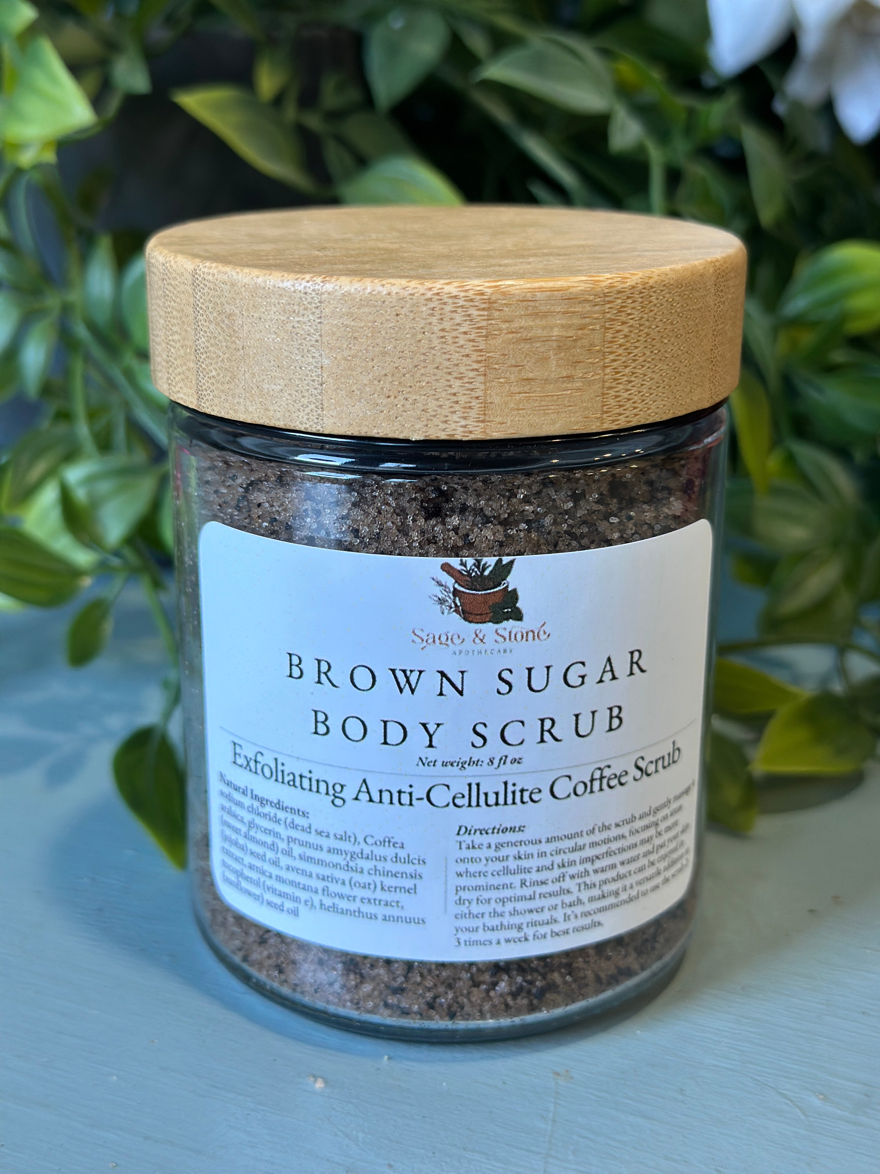 Sage & Stone Apothecary exfoliating coffee scrub for cellulite reduction, featuring natural ingredients in a jar.