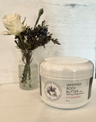 Sage & Stone Apothecary magnesium body butter in a jar, creamy texture for nourishing skin and promoting relaxation.