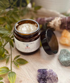 Sage & Stone Apothecary Calcium Bentonite Clay Mask in a jar, showing the natural clay texture for body care and wellness.
