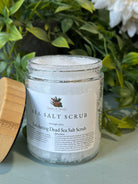 Sage & Stone Apothecary exfoliating Dead Sea Salt scrub in a jar, showing the textured salt and natural ingredients for body care.