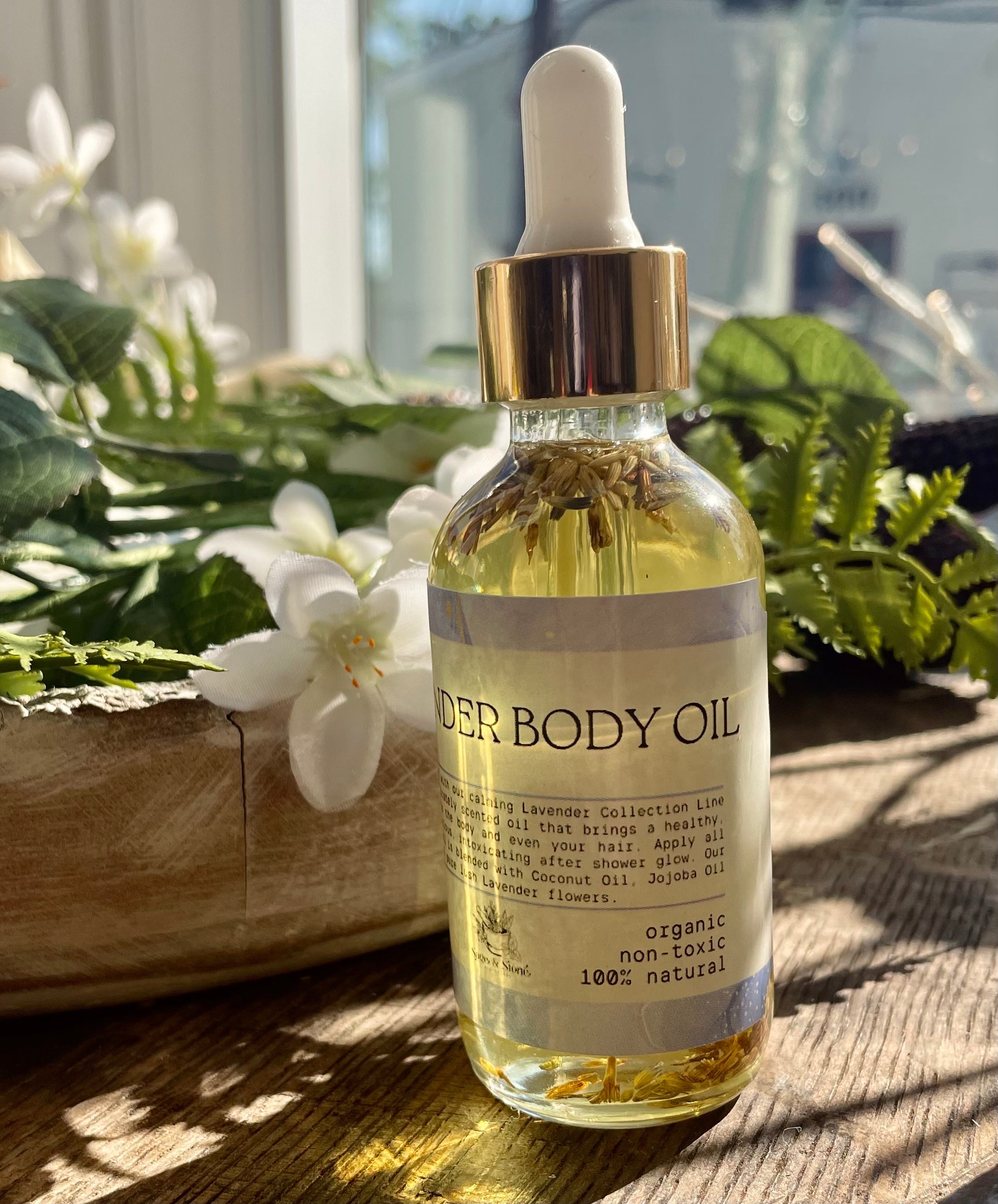 Sage & Stone Apothecary lavender body oil bottle with dropper, natural and calming body care product for wellness.