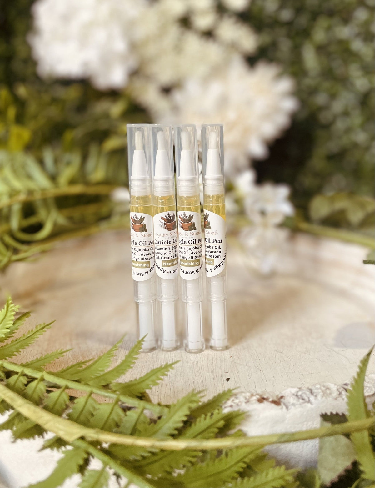 Sage & Stone Apothecary nourishing cuticle oil pen with a sleek design, ideal for hydrating and softening cuticles and nails.