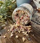 Facial steam from Sage & Stone Apothecary's Resting Witch Face collection, featuring herbal ingredients in a glass bowl with steam rising.