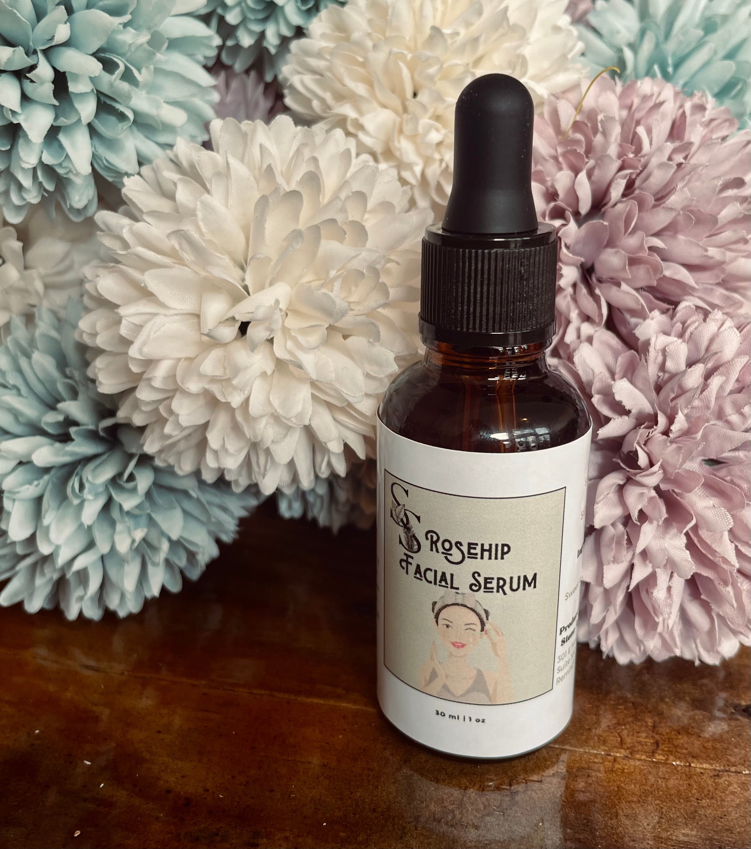 Sage & Stone Apothecary Rose Hip Facial Serum bottle for body care and wellness, with a natural, botanical design.
