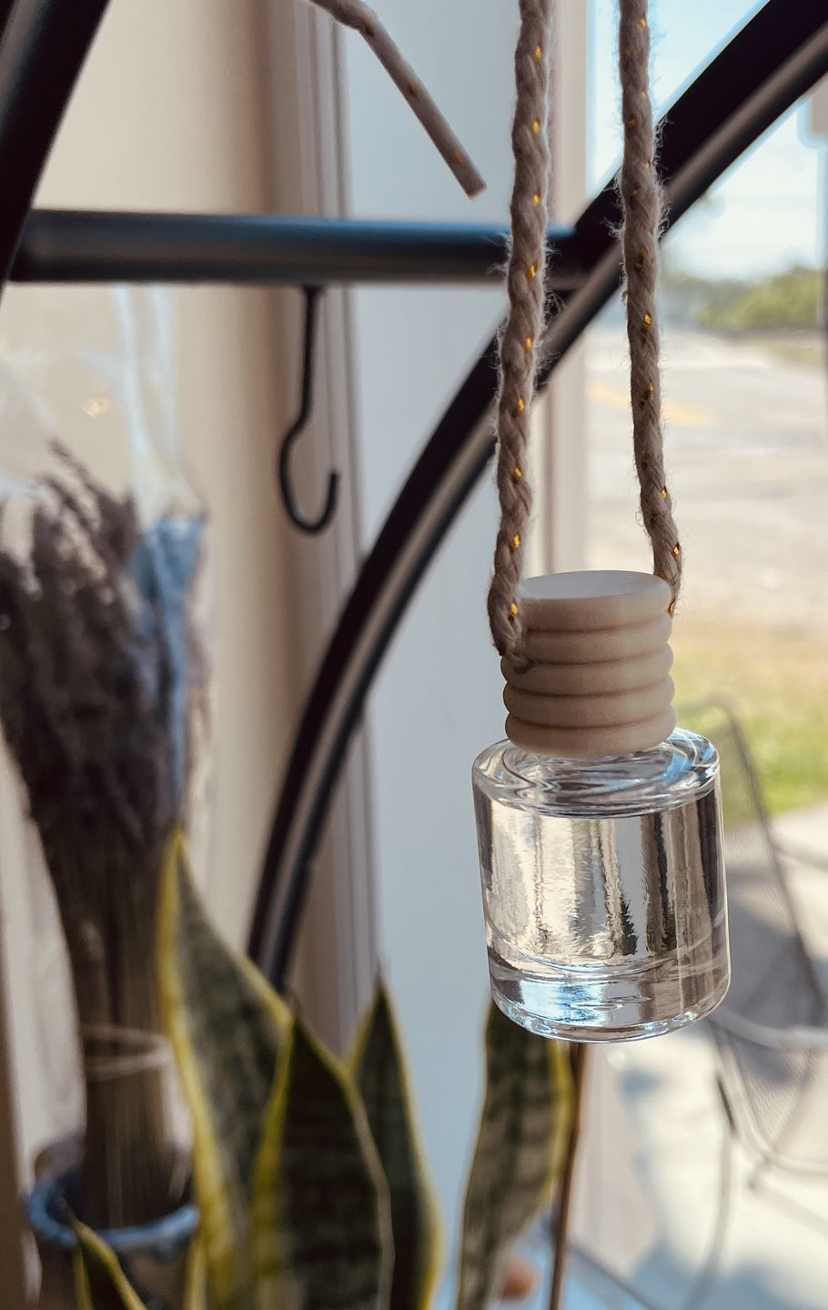 Coastal Cottage Car Diffuser by Sage & Stone Apothecary, showcasing the diffuser with scent reeds in a coastal-themed design.