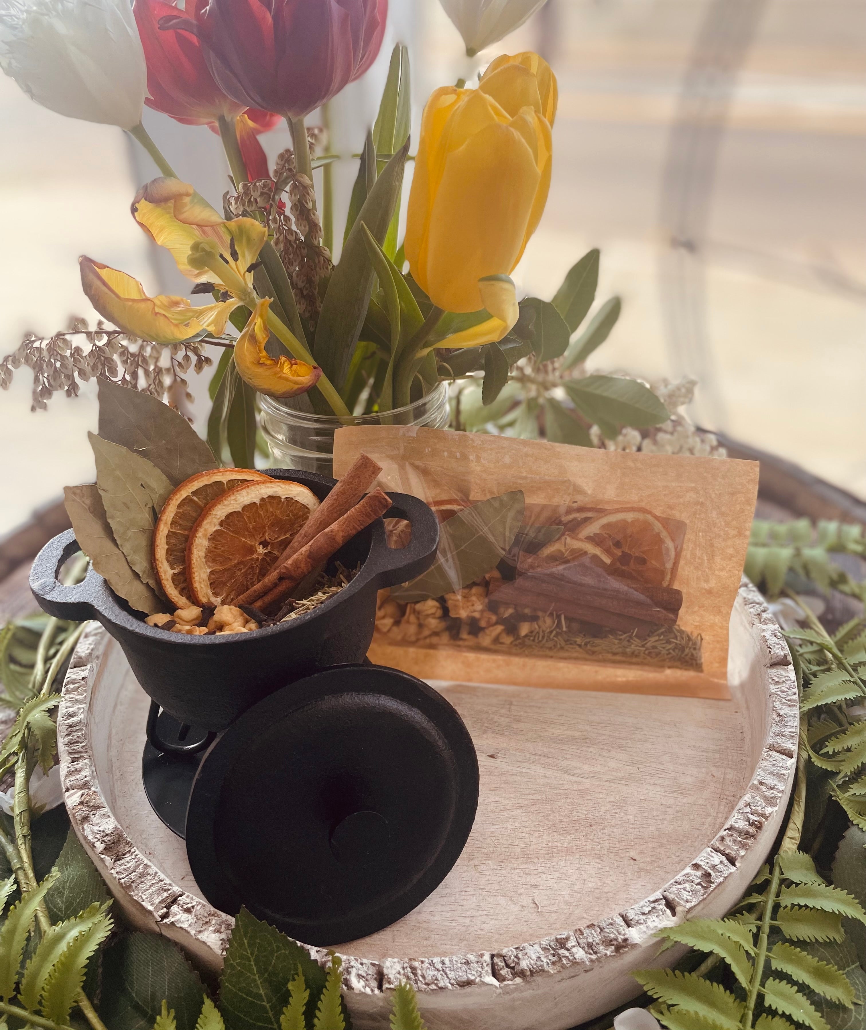 Sage & Stone Apothecary Abundance Simmer Pot Blend in a jar with dried herbs and spices for aromatic simmering.