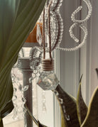Cashmere Musk hanging car diffuser by Sage & Stone Apothecary, featuring a stylish design for freshening vehicle interiors.