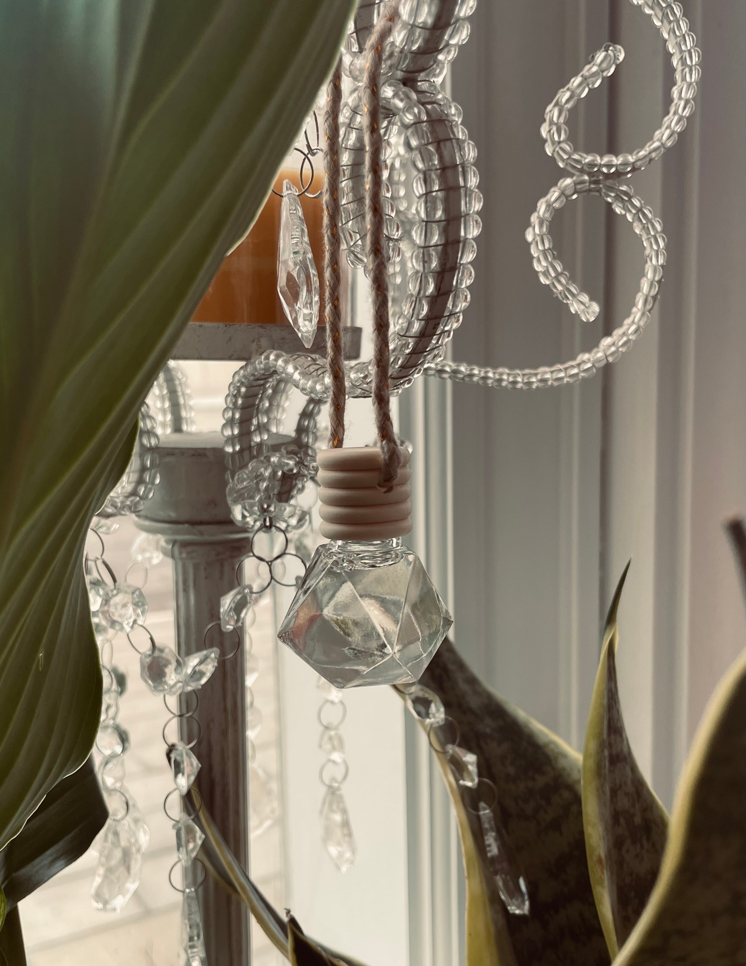 Cashmere Musk hanging car diffuser by Sage & Stone Apothecary, featuring a stylish design for freshening vehicle interiors.