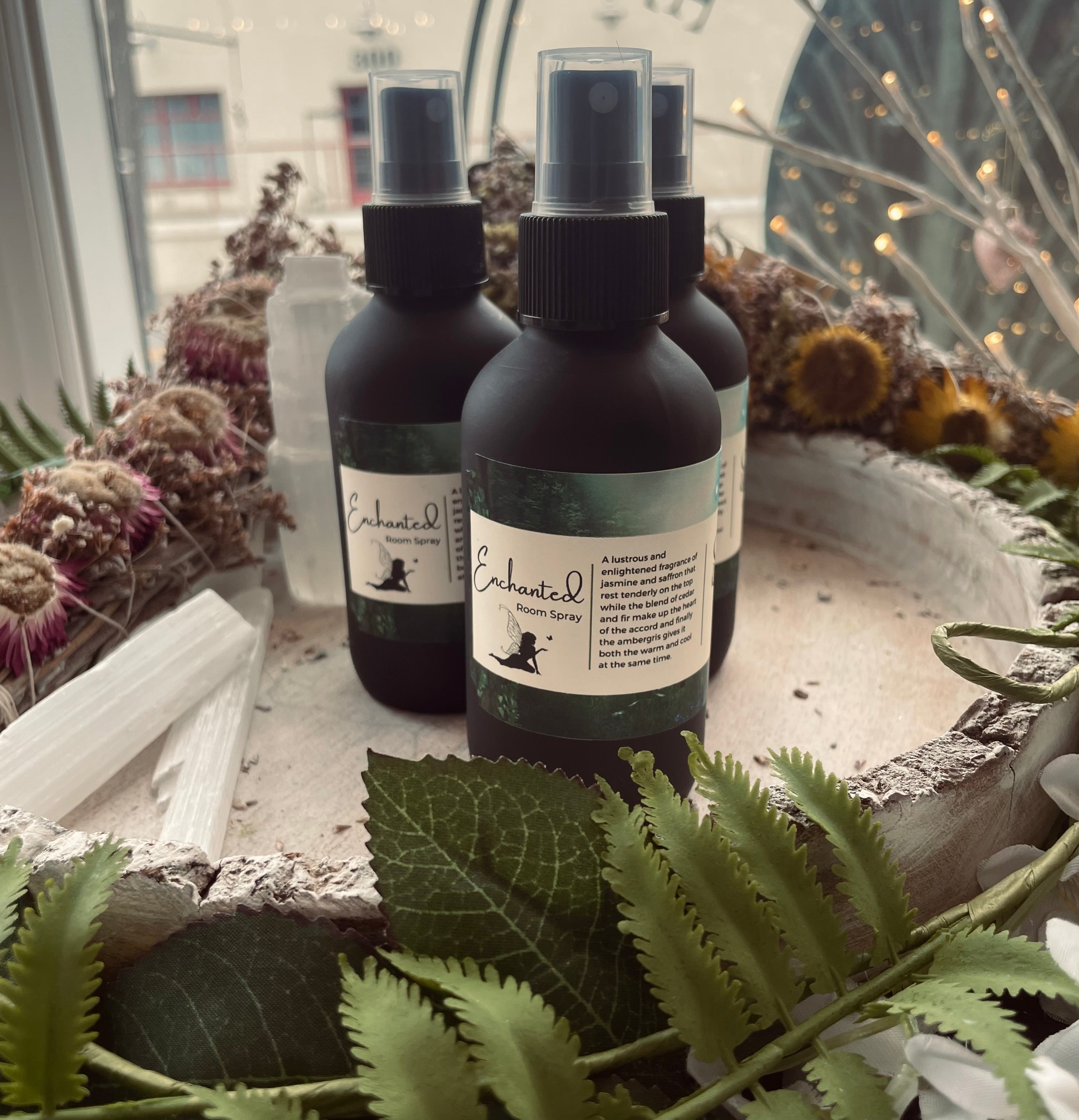Sage & Stone Apothecary enchanted room spray bottle with floral and herbal design, ready for home fragrance use.