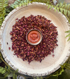 Rose clay lotion bar by Sage & Stone Apothecary showing a smooth, rounded skincare bar with rose clay texture.