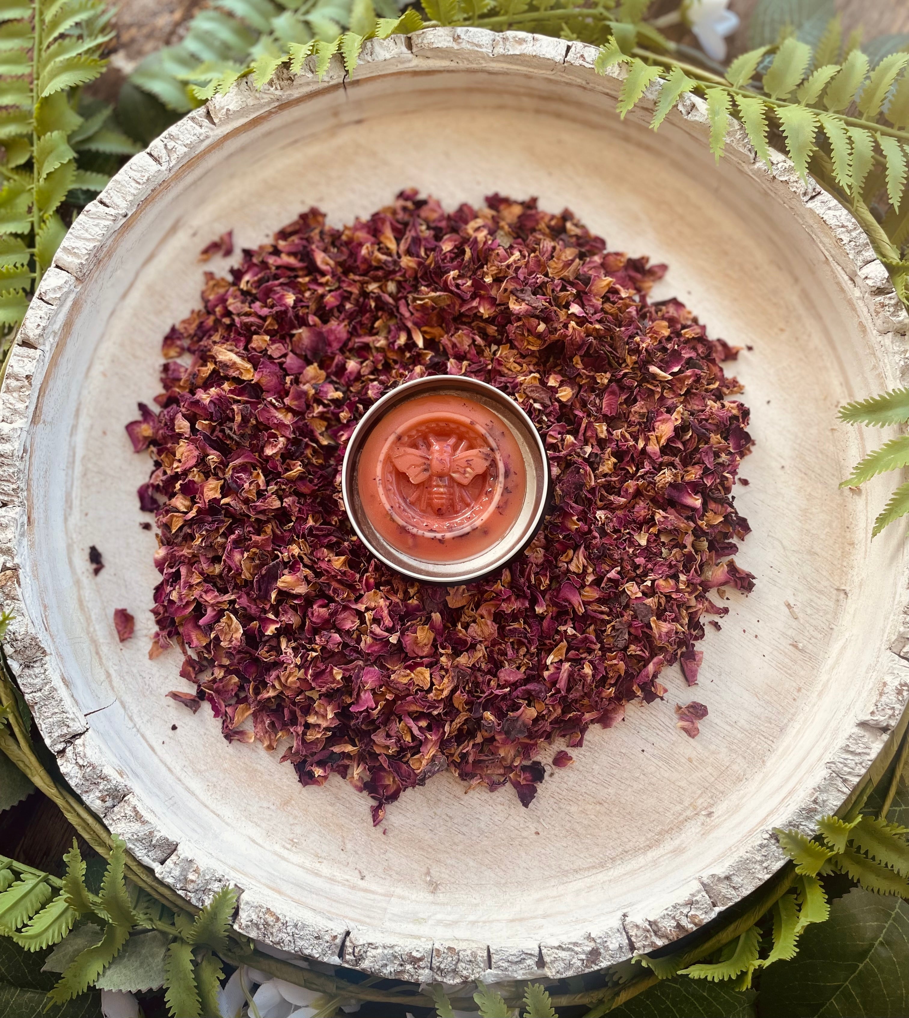 Rose clay lotion bar by Sage & Stone Apothecary showing a smooth, rounded skincare bar with rose clay texture.