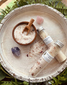 Set of Ruby Rose bath salt tubes by Sage & Stone Apothecary, featuring colorful, aromatic bath salts in sleek packaging.