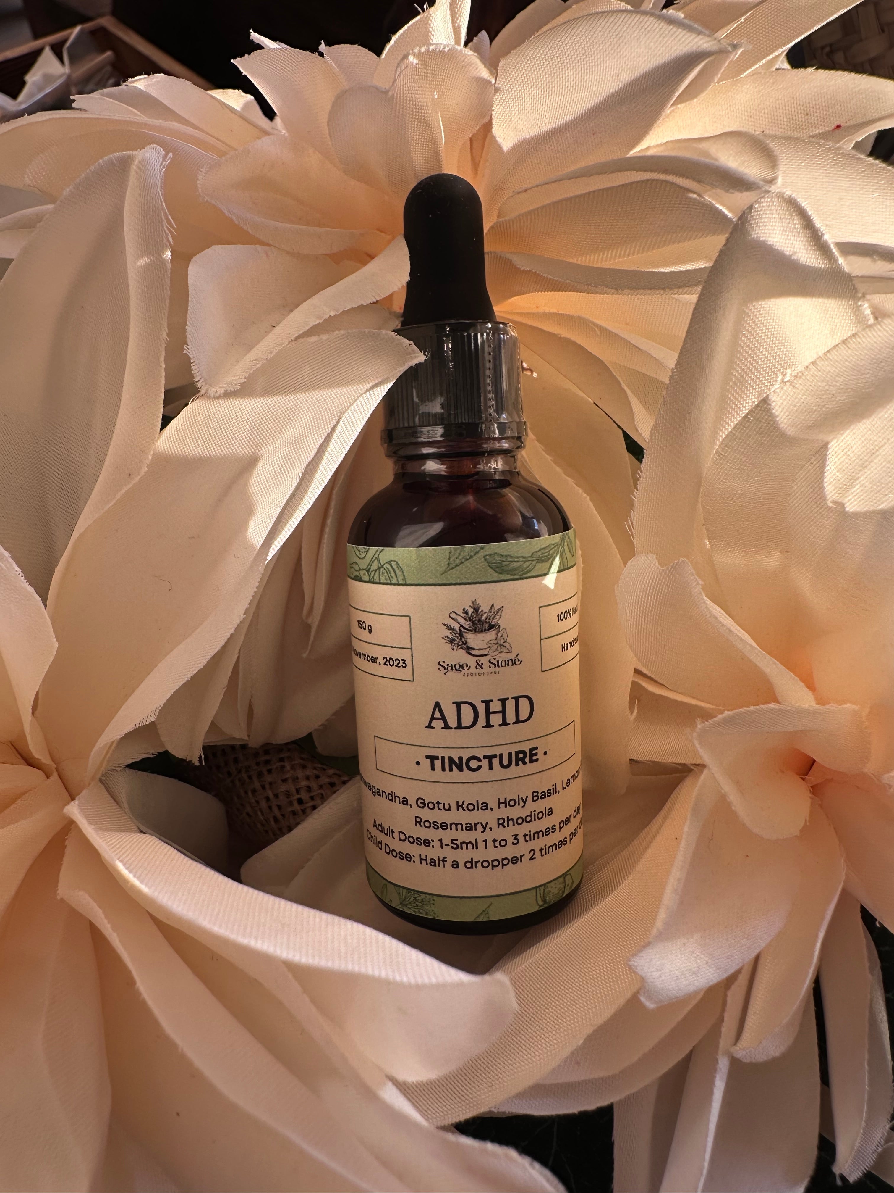 Herbs ADHD tincture bottle from Sage & Stone Apothecary with dropper cap, displayed on a neutral background.