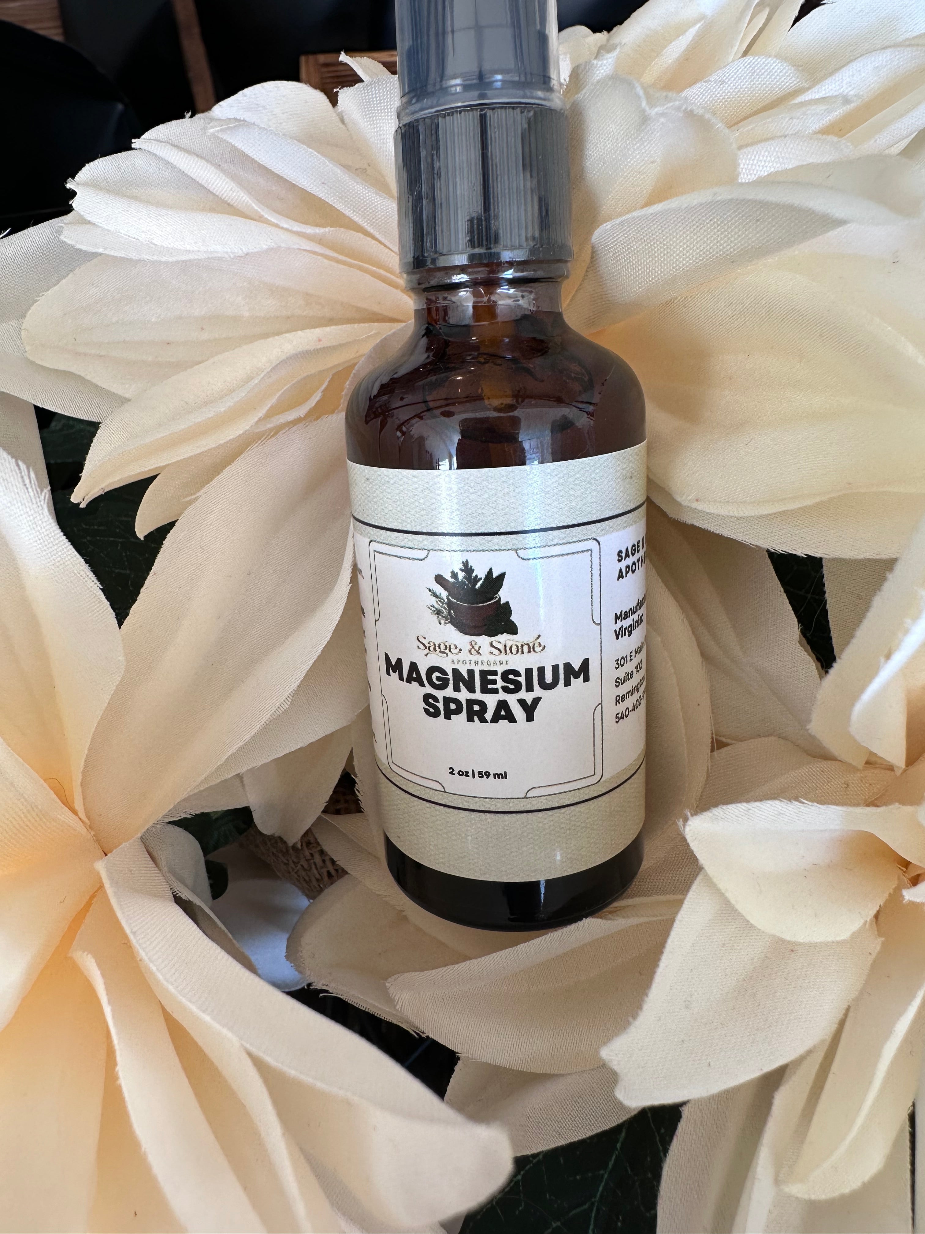 Sage & Stone Apothecary magnesium oil spray bottle, natural magnesium topical spray for muscle relaxation and skin absorption.