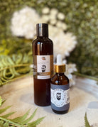 Gentlemen's Club Beard Wash by Sage & Stone Apothecary, a men’s beard cleansing product in a sleek bottle with label details visible.
