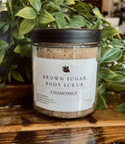 Brown Sugar Chamomile Scrub by Sage & Stone Apothecary, showing a jar of exfoliating personal care product with natural ingredients.
