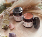 Sage & Stone Apothecary Moroccan Red Clay Mask in a jar, showing the vibrant red clay and natural skincare ingredients.