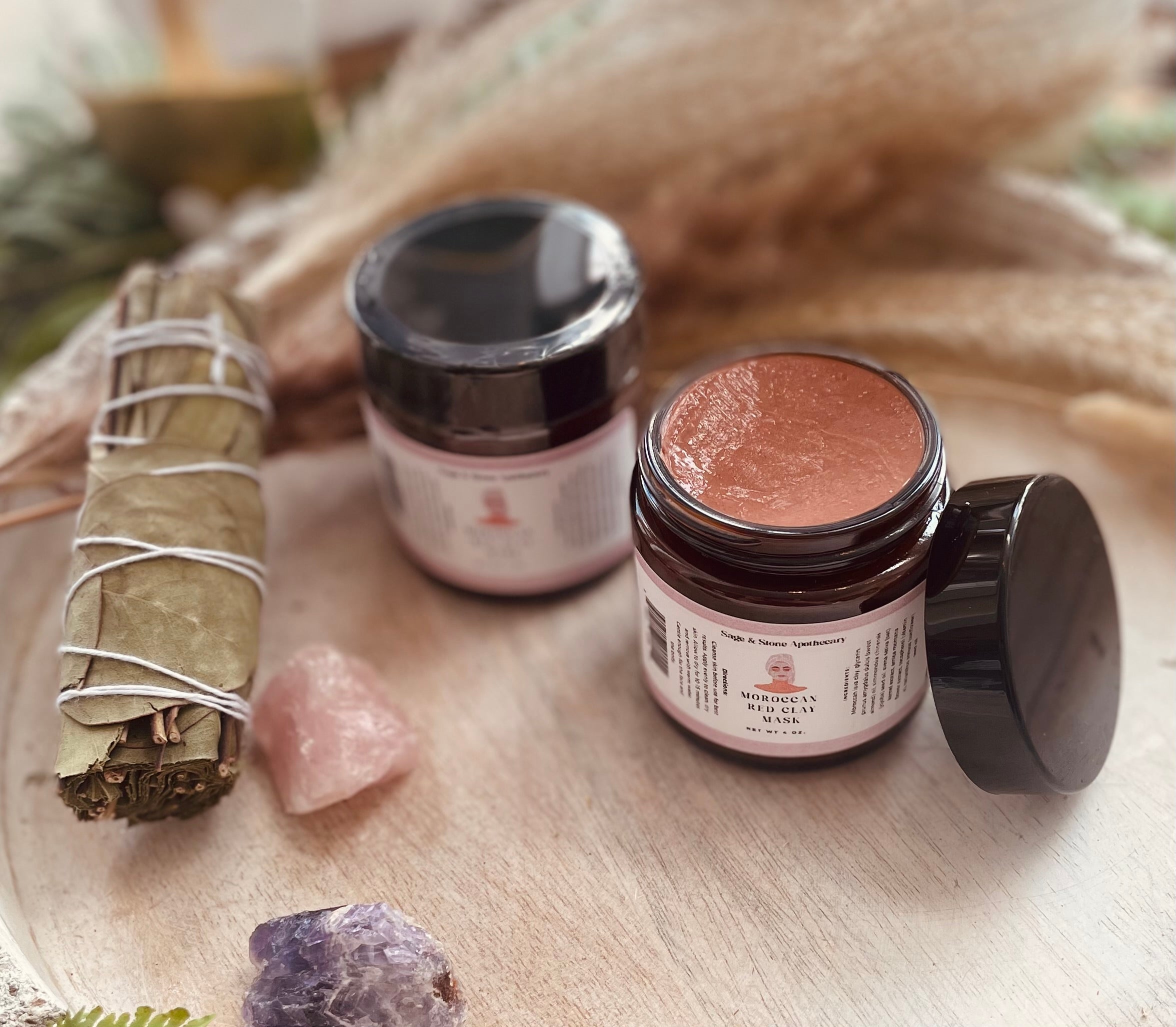 Sage & Stone Apothecary Moroccan Red Clay Mask in a jar, showing the vibrant red clay and natural skincare ingredients.