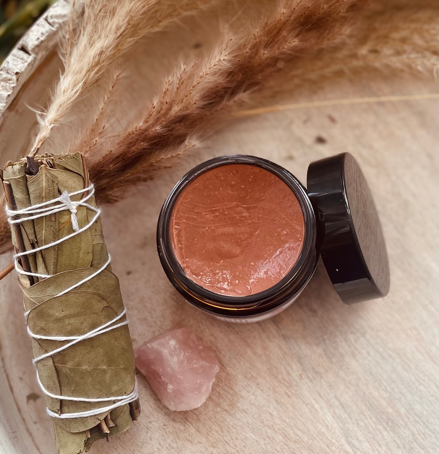 Sage & Stone Apothecary Moroccan Red Clay Mask in a jar, showing the vibrant red clay and natural ingredients for body care.