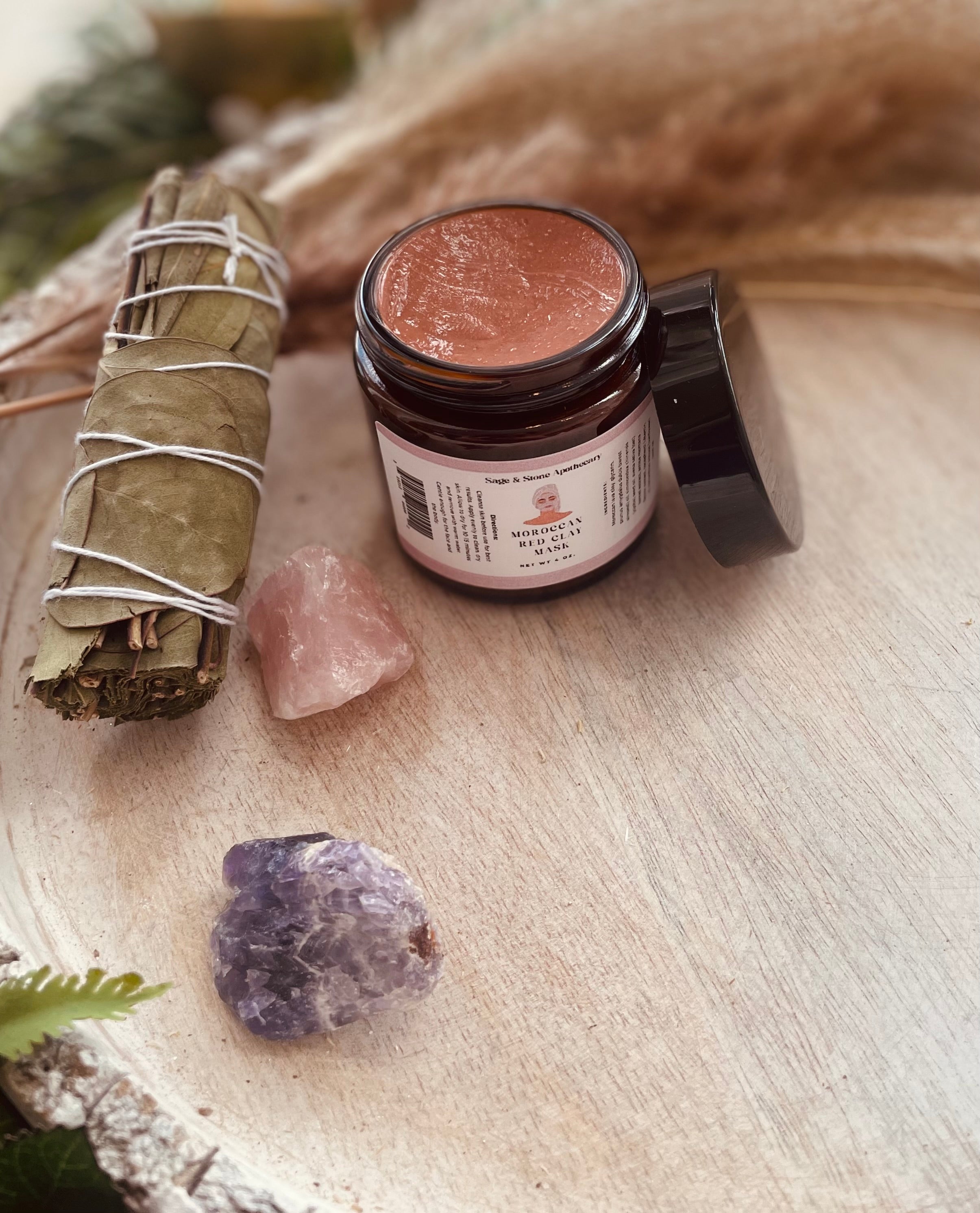 Sage & Stone Apothecary Moroccan Red Clay Mask in a jar, showcasing vibrant red clay for body and skin wellness.