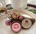 Persephone Lotion Bar by Sage & Stone Apothecary shown in a natural setting, highlighting its smooth, solid body care form.