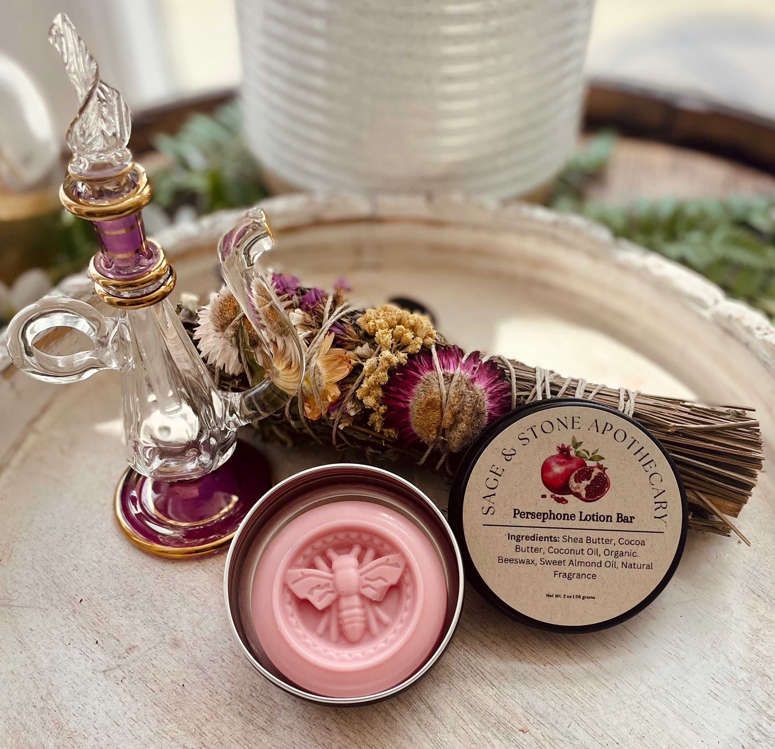 Persephone Lotion Bar by Sage & Stone Apothecary shown in a natural setting, highlighting its smooth, solid body care form.