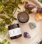 Sage & Stone Apothecary Dead Sea Black Mud Mask in a jar, showing the dark, smooth clay mask for skin detox and cleansing.