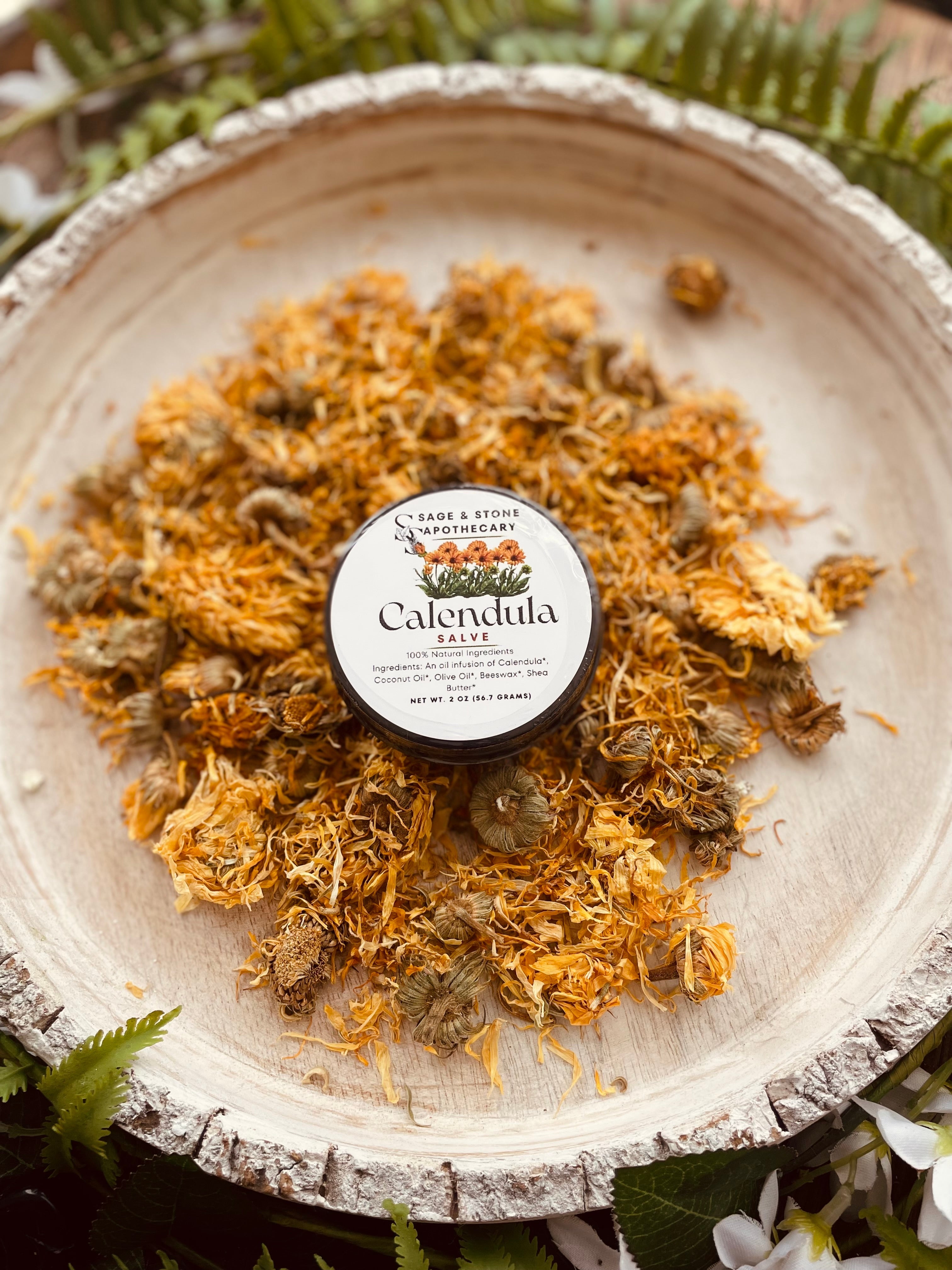 Calendula salve from Sage & Stone Apothecary for skin care, featuring natural ingredients in a soothing personal wellness product.